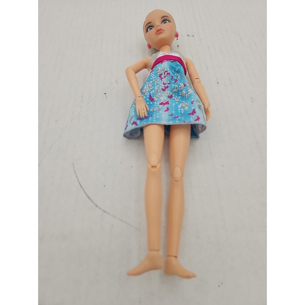 2009 Blonde Spin Master Doll With Dress